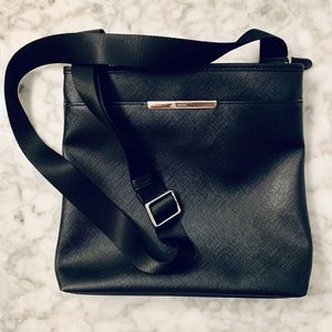 Tumi crossbody bag, black leather
